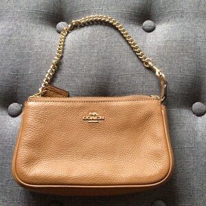 Coach clutch with strap